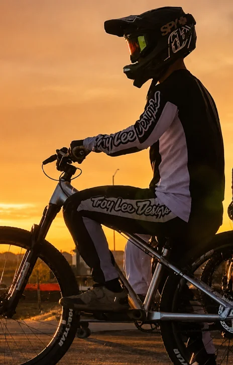 Riding at sunset in full race kit