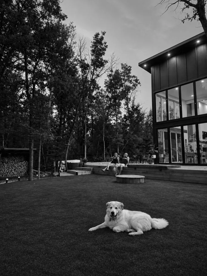 Jason's mum and Theo on the lawn after a day working on the house