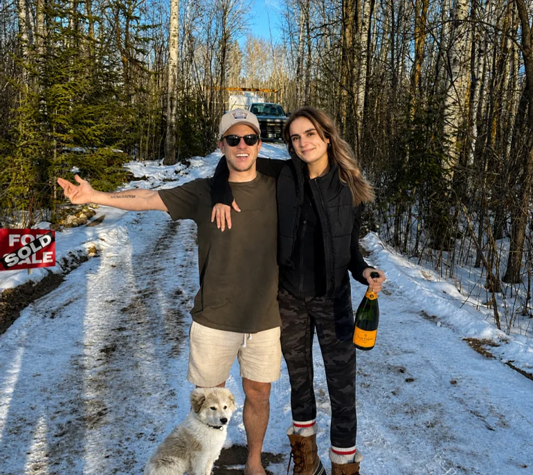 Jason and Steph on the driveway the day the land sold