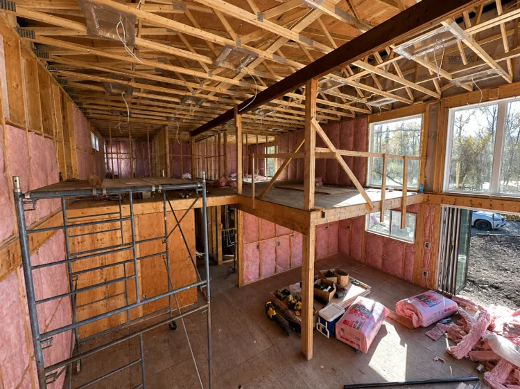 Insulation going into the framed second floor
